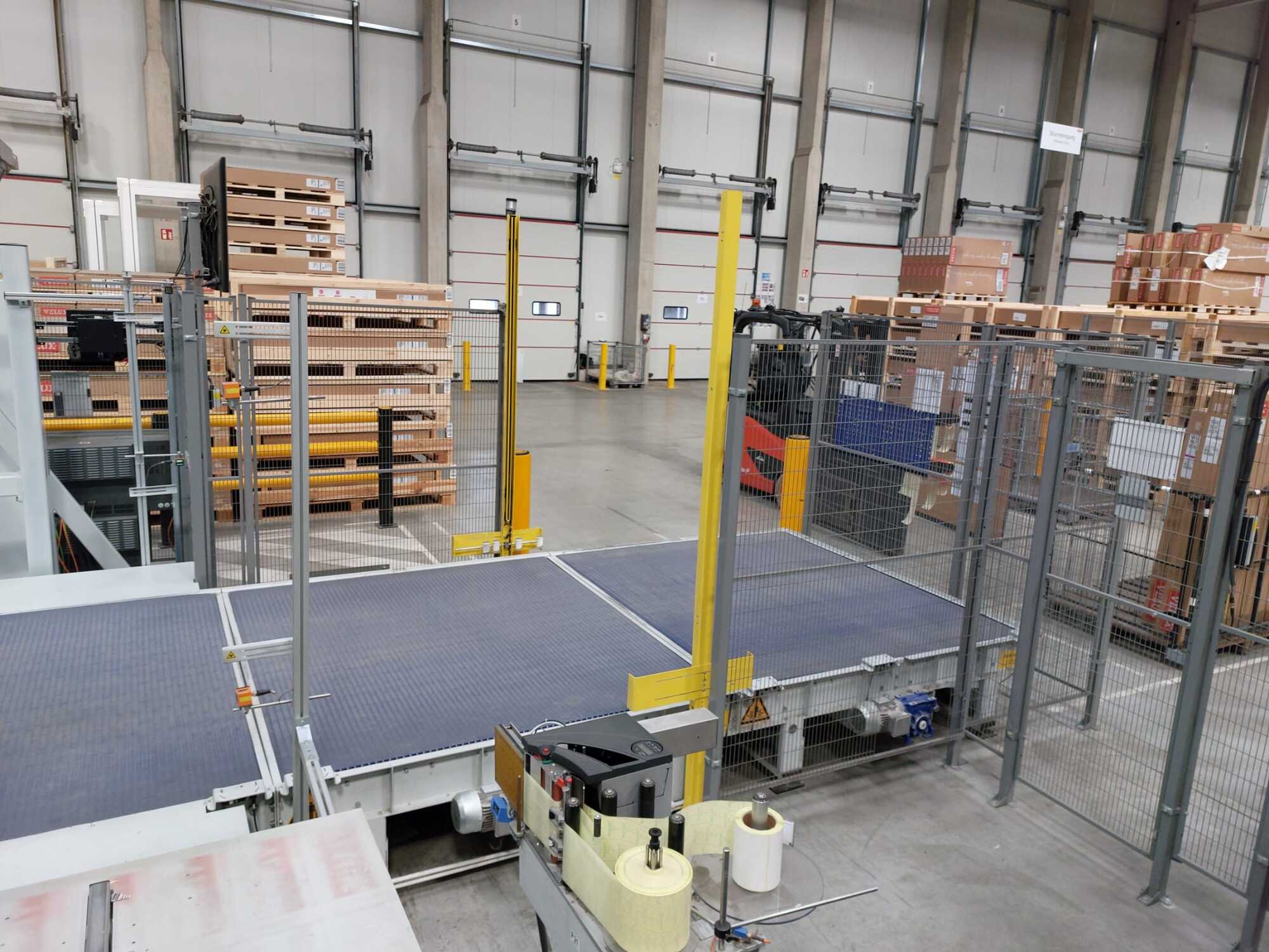 Industrieroboter mit Förderbandsystem u. Sicherheitszaun / FANUC / M-2000iA/1700L