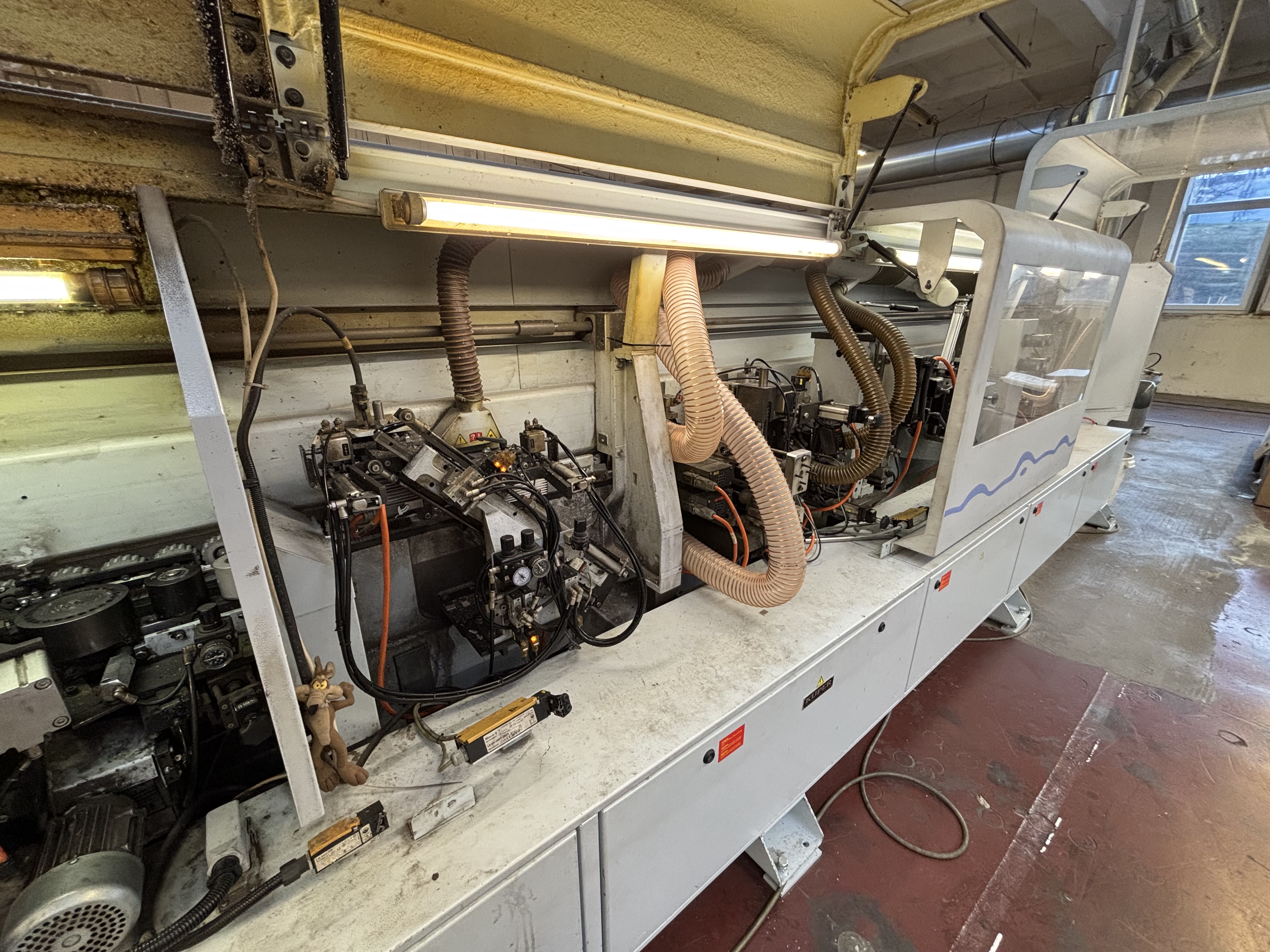 einseitige Kantenanleimmaschine mit Werkstück-Rückführung / BRANDT / KDF 680