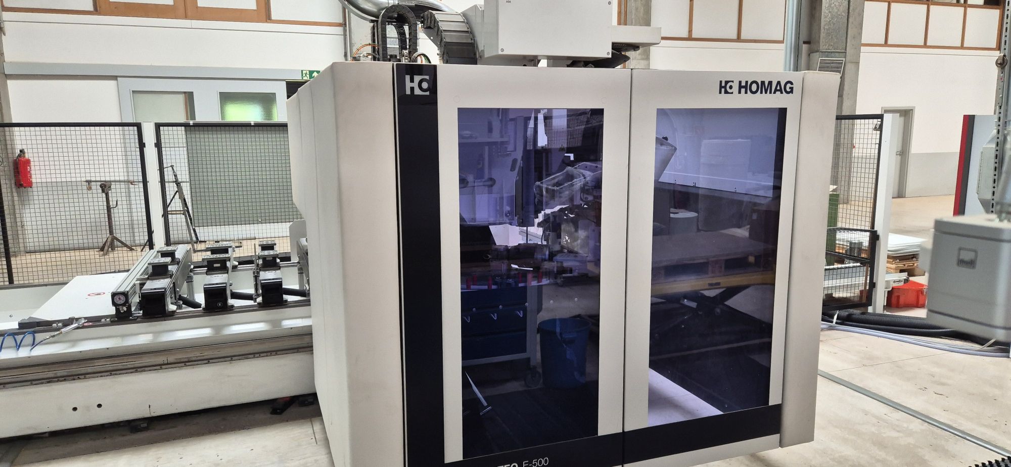 CNC-Bearbeitungszentrum mit Leimaggregat / HOMAG / CENTATEQ E-500