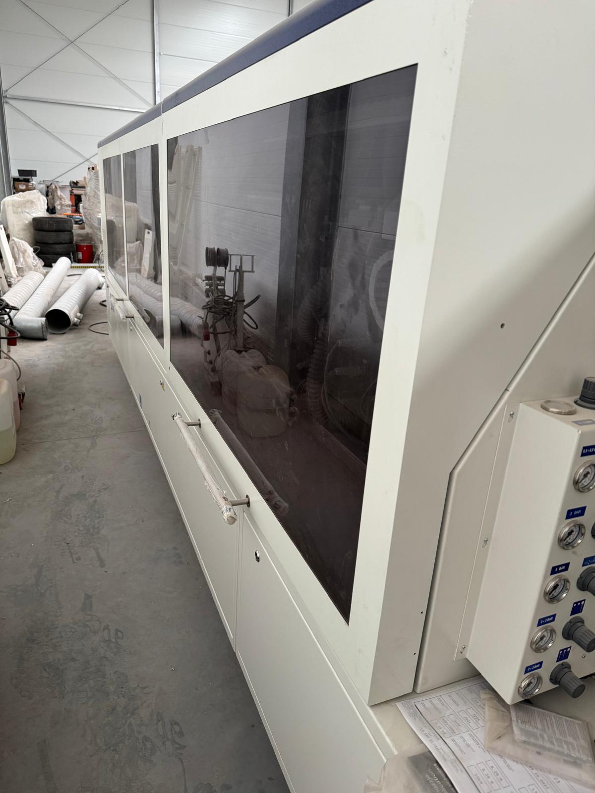Industrielle automatsiche Kantenanleimmaschine mit Rückführung / SCM / Stefani md