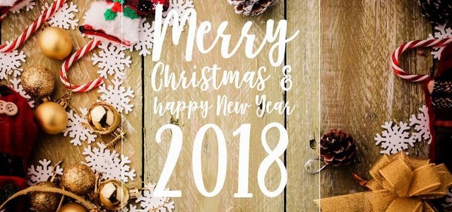 festive background concept with christmas decorating items on wooden background with light filter